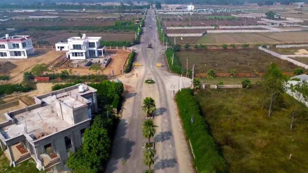 Top 5 Reasons to Invest in Managed Farmland in Lucknow Today 2 Aerial view of The Villagio Farmhouse managed farmland gated community plots near Mohanlalganj