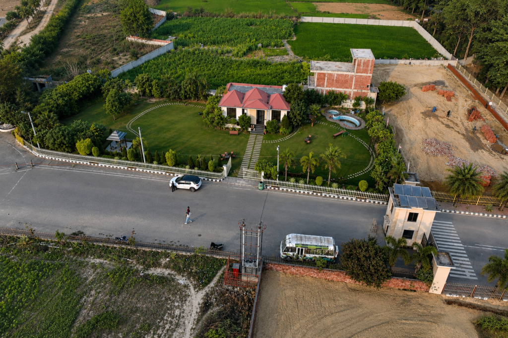 Premium 20000 sq ft royal farmland plot bordering Sai River at The Villagio
